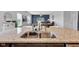 Close-up of a kitchen featuring granite countertops, a stainless steel sink, and modern fixtures at 937 Maple Stone Dr, Greenwood, IN 46143