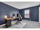 Sleek home office with a spacious desk, offering a practical and stylish workspace for productivity at 937 Maple Stone Dr, Greenwood, IN 46143