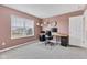 Bright home office featuring a large window and practical furniture arrangement, enhancing work-from-home efficiency at 937 Maple Stone Dr, Greenwood, IN 46143
