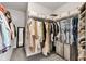 Functional walk-in closet featuring organized clothing racks, shelves, and storage solutions for modern living at 937 Maple Stone Dr, Greenwood, IN 46143