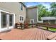 A wood deck, complete with built-in seating and a wooden fence, provides an ideal outdoor retreat at 9650 Copley Dr, Carmel, IN 46290
