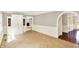 Elegant dining room features tile floors, detailed molding, and built-in cabinets with decorative glass at 9650 Copley Dr, Carmel, IN 46290