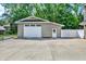 Exterior view of a spacious detached garage, providing ample parking and storage space at 9650 Copley Dr, Carmel, IN 46290