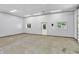 Spacious garage interior with ample lighting and neutral finishes, ready for customization and use at 9650 Copley Dr, Carmel, IN 46290