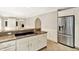 The kitchen showcases granite countertops and stainless steel appliances at 9650 Copley Dr, Carmel, IN 46290