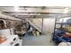 Spacious basement with exposed ceiling, brick walls, laundry facilities, and potential for customizable storage solutions at 1002 N New Jersey St, Indianapolis, IN 46202