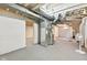 Unfinished basement showcasing utilities, exposed ductwork and ample open space at 1020 N Ritter Ave, Indianapolis, IN 46219