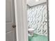 Cozy bathroom featuring a vibrant tile floor and a stylish patterned shower curtain at 1020 N Ritter Ave, Indianapolis, IN 46219