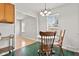 View of dining nook and kitchen, showcasing the seamless transition and bright space at 1020 N Ritter Ave, Indianapolis, IN 46219