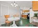 Charming dining area with views to kitchen, perfect for intimate meals and entertaining at 1020 N Ritter Ave, Indianapolis, IN 46219
