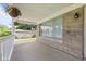 Comfortable front porch with stone cladding, offering a shaded and relaxing outdoor space at 1020 N Ritter Ave, Indianapolis, IN 46219