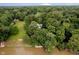 A peaceful home surrounded by lush greenery and river access, creating a private and serene oasis at 1065 E 76Th St, Indianapolis, IN 46240