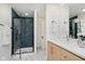 Contemporary bathroom featuring a sleek glass shower, floating vanity, and modern fixtures at 1065 E 76Th St, Indianapolis, IN 46240