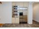 Kitchen with stainless steel oven, microwave, refrigerator, and custom cabinets at 1065 E 76Th St, Indianapolis, IN 46240