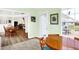 Breakfast nook with a round table and chairs, offering scenic views and seamless access to the backyard patio at 10712 Cardinal Cir, Indianapolis, IN 46231
