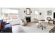 Spacious living room with bright walls, fireplace, and an open layout ideal for entertaining at 10712 Cardinal Cir, Indianapolis, IN 46231
