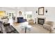 Spacious living room featuring bright walls, a fireplace, and an open layout perfect for entertaining at 10712 Cardinal Cir, Indianapolis, IN 46231