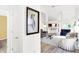 Bright living room featuring neutral walls, a high ceiling, and an open layout at 10712 Cardinal Cir, Indianapolis, IN 46231