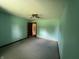 Bright bedroom features neutral carpet and ample natural light at 1082 E County Road 400 S, Clayton, IN 46118