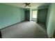 Bright bedroom includes carpet, neutral walls and a view of two closets at 1082 E County Road 400 S, Clayton, IN 46118