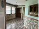 The Dining Room features floral wallpaper and a decorative chandelier at 1082 E County Road 400 S, Clayton, IN 46118