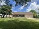 Charming single-story brick home with a covered front porch and an attached two-car garage at 1082 E County Road 400 S, Clayton, IN 46118