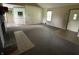 Spacious living room boasts a brick fireplace, and lots of natural light at 1082 E County Road 400 S, Clayton, IN 46118