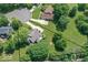 Aerial view of a property highlighting the home's location, surrounding trees, and lot size at 11030 Brentwood Ave, Zionsville, IN 46077