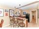 Basement bar with stools, perfect for casual entertaining and social gatherings at 11030 Brentwood Ave, Zionsville, IN 46077