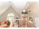 Bright entryway featuring a chandelier, high ceilings, arched window, and staircase with wooden railings at 11030 Brentwood Ave, Zionsville, IN 46077
