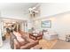 Bright living room boasts a view into the kitchen and second floor and features hardwood flooring at 11030 Brentwood Ave, Zionsville, IN 46077