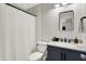 Modern bathroom featuring elegant vanity, subway tile shower, and stylish fixtures at 11518 Cherry Blossom W Dr, Fishers, IN 46038