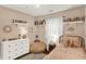 Charming bedroom featuring stylish decor and a cozy, inviting atmosphere at 11518 Cherry Blossom W Dr, Fishers, IN 46038