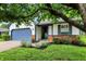 Charming single Gathering home featuring an attached garage and mature landscaping in a suburban neighborhood at 11518 Cherry Blossom W Dr, Fishers, IN 46038