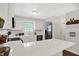 Well-lit kitchen featuring white cabinets, countertops and stainless steel appliances at 11518 Cherry Blossom W Dr, Fishers, IN 46038