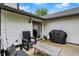 Relaxing patio space offering comfortable seating, string lights, and convenient access to the home at 11518 Cherry Blossom W Dr, Fishers, IN 46038