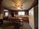 Kitchen and dining area, featuring wood cabinets, dining table, and white refrigerator at 1206 Lincoln St, Shelbyville, IN 46176