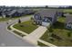 Aerial view of a two-story home with an attached garage and a long driveway at 1278 W Limestone Way, Fortville, IN 46040
