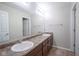 Bathroom featuring dual sinks and wood-look floors at 1278 W Limestone Way, Fortville, IN 46040