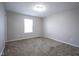 Neutral bedroom with carpet, window, and white trim. Simple and cozy for relaxation at 1278 W Limestone Way, Fortville, IN 46040