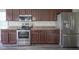 Well-equipped kitchen with stainless steel appliances and sleek cabinetry at 1278 W Limestone Way, Fortville, IN 46040