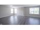 Spacious room with several windows providing natural light, and neutral walls, and hard surface flooring at 1278 W Limestone Way, Fortville, IN 46040