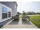 A paved patio with raised garden beds in the backyard at 1278 W Limestone Way, Fortville, IN 46040