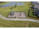 Aerial view of a community playground with a slide, climbing bars, and swings at 1278 W Limestone Way, Fortville, IN 46040