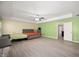 Spacious main bedroom suite with hardwood floors, tray ceilings, and and furniture at 1312 Donald Pass, Greenwood, IN 46143