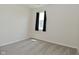 Clean and empty bedroom features plush carpet and a window at 1351 Byron St, Greenfield, IN 46140
