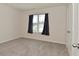 Clean bedroom with plush carpet and natural light at 1351 Byron St, Greenfield, IN 46140