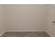 Walk-in closet with wire shelving and neutral-toned carpeting at 1351 Byron St, Greenfield, IN 46140