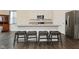 Contemporary kitchen featuring stainless steel appliances, granite countertops, and island seating at 1351 Byron St, Greenfield, IN 46140