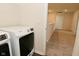 A convenient laundry room with modern washing machines at 1351 Byron St, Greenfield, IN 46140